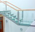 Стеклянные ступени и стеклянная площадка на лестнице в Омске. Готовые проекты ПерилаГлавСнаб - фото 1